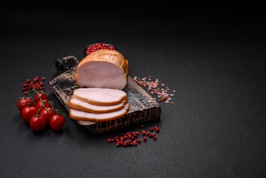 Delicious smoked pork or chicken meat with salt, spices and herbs photo