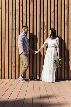 Wedding walk in the pine forest. Sunny day. photo