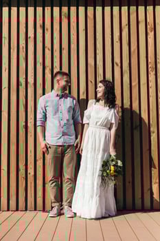 Wedding walk in the pine forest. Sunny day. photo
