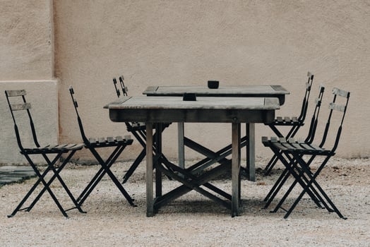 Wooden table and chairs on the terrace photo