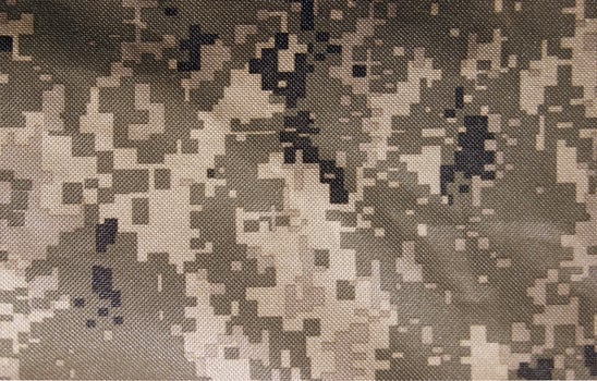 The Universal Camouflage Pattern, also referred to as Army Combat Uniform Pattern or Digital military camouflage. photo