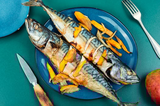 Baked mackerel with mango, seafood. photo