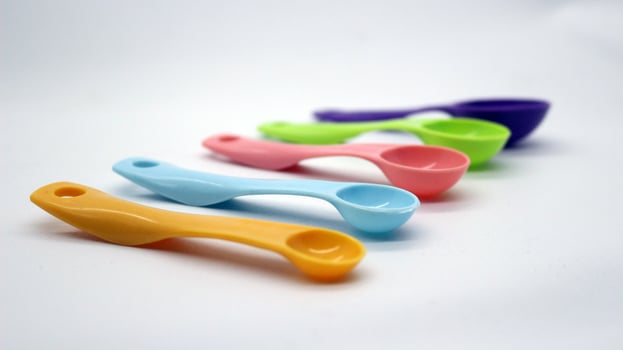 Measuring spoons in various colors photo