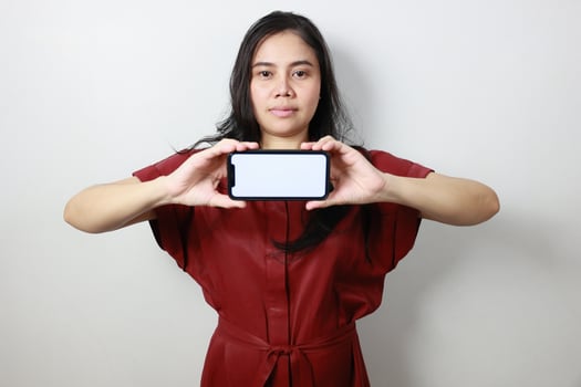 Person of a woman holding phone photo