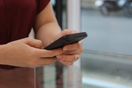 Female hand using phone, social concept photo