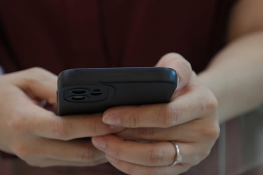 Hand using smartphone, technology concept photo