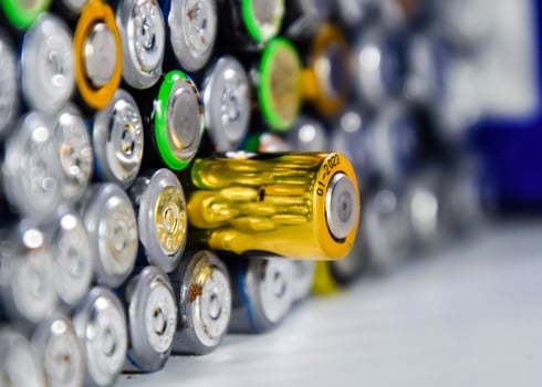 Salt and alkaline batteries, source of energy for portable technology. AAA and AA batteries photo