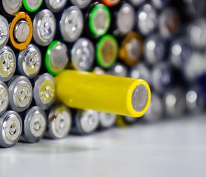 Salt and alkaline batteries, source of energy for portable technology. AAA and AA batteries photo