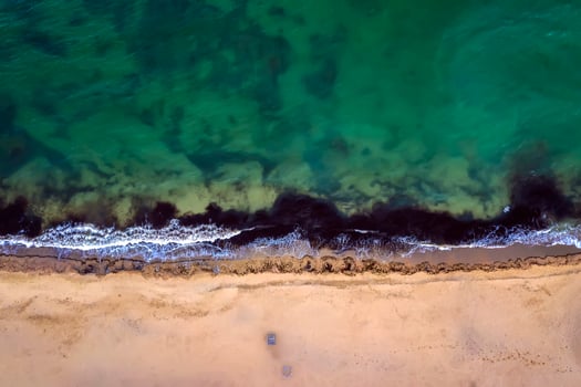 Top view aerial photo from flying drone of beautiful sea landscape with turquoise water with copy space for your advertising text message or promotional content. website background.