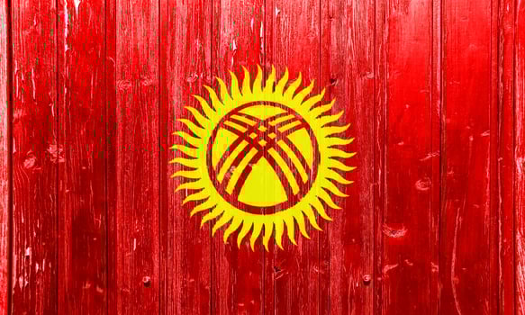 Flag of Kyrgyz Republic on a textured background. Concept collage. photo