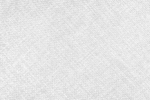 Jacquard woven upholstery, white coarse fabric texture with diagonal weave lines, close up photo