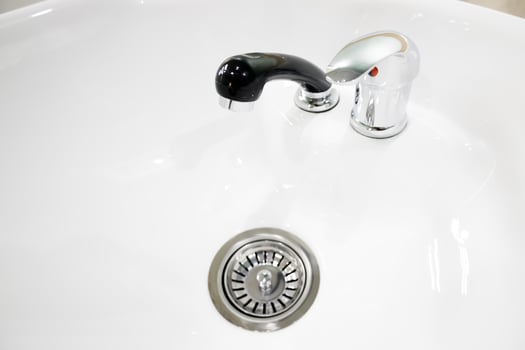 crystal clear hair wash in a beauty salon with black watering. selective focus.High quality photo