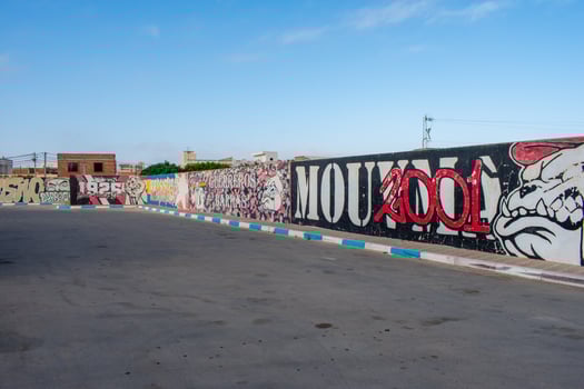 6.11.23 El Jem, Tunisia Street art  Political Graffiti on walls in City of El Jem Tunisia photo