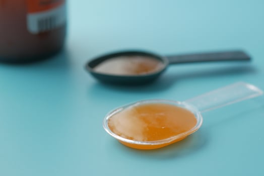 A dose of cough syrup. photo