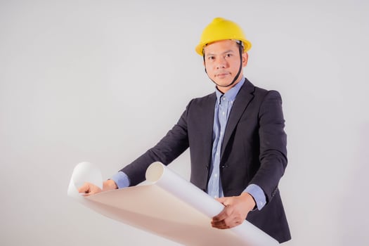 Asian male engineer on white background photo