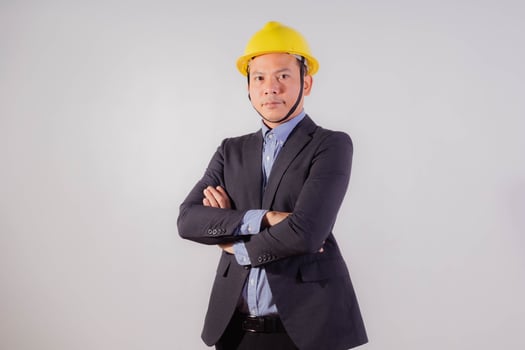 Asian male engineer on white background photo