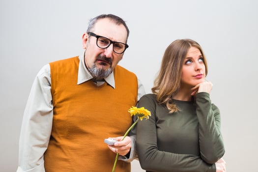 Nerdy man wants to marry to a beautiful woman,but she is not interested. photo