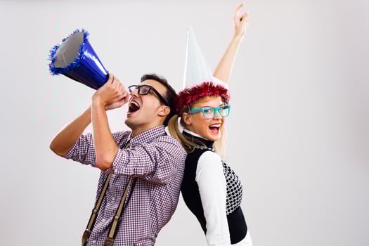 Nerdy man and woman having party photo