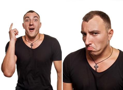 Athletic young man posing and looking at the camera, isolated on a white background photo