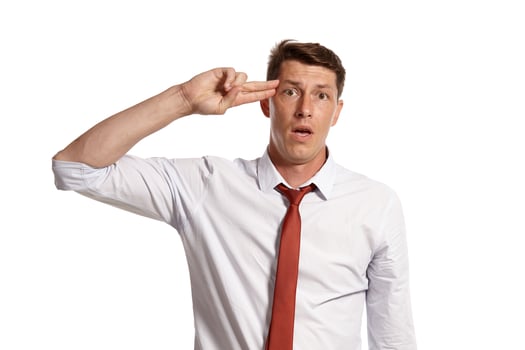 Portrait of a young brunet man posing in a studio isolated over a white background. photo