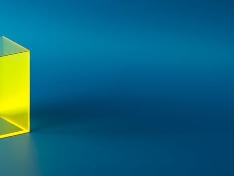 gold cube isolated on blue background. photo