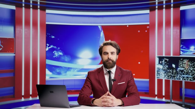 News anchor presenting events live on international television, talking about latest news. Media presenter covers politics or economics topics on tv program, broadcasting advertisement. photo