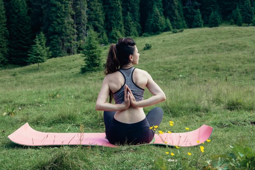 Healthy young independent female yoga practitioner photo