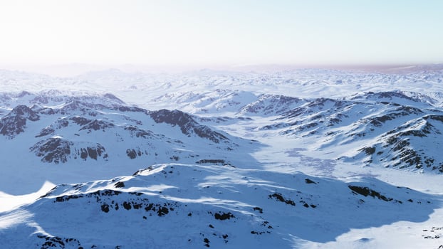 Snow-covered mountain range with a breathtaking backdrop photo