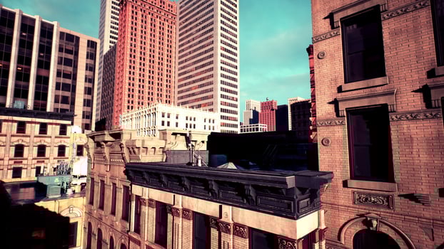 shot of a city's skyline, highlighting the tops of its skyscrapers at twilight photo