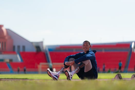 Athletes with disabilities take a break at the stadium between training sessions. photo