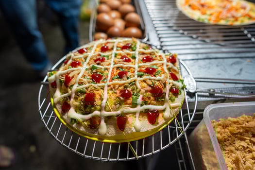 Close up of Banh Trang Nuong Or local vietnam pizza is a popular street food for tourist and people in Da Lat, Vietnam photo