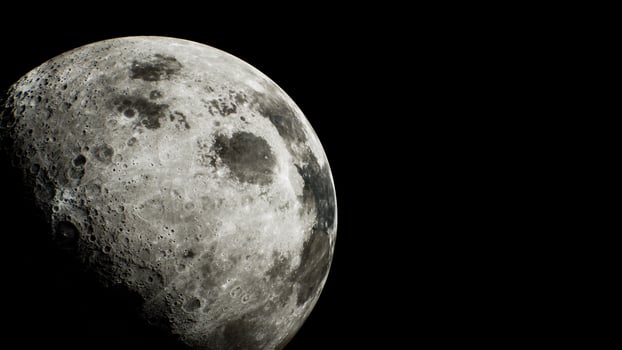 glimpse of the sunlit crescent of the moon from outer space photo