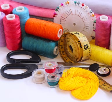 Tailor Sewing Accessories on White Background photo