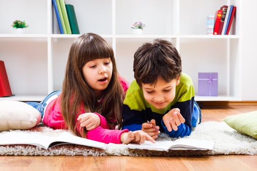 Children doing homework and talking photo