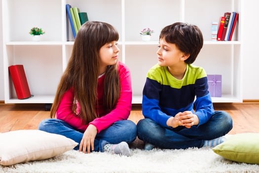 Two children are thinking what to play photo