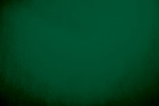 Green velvet fabric texture used as background. Emerald color panne fabric background of soft and smooth textile material. crushed velvet .luxury emerald tone for silk.. photo