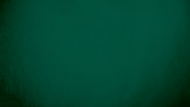 Green velvet fabric texture used as background. Emerald color panne fabric background of soft and smooth textile material. crushed velvet .luxury emerald tone for silk.. photo
