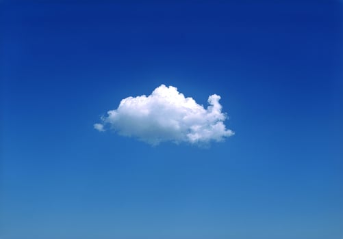 Single white cloud isolated over blue sky background, summer fluffy cloud photo
