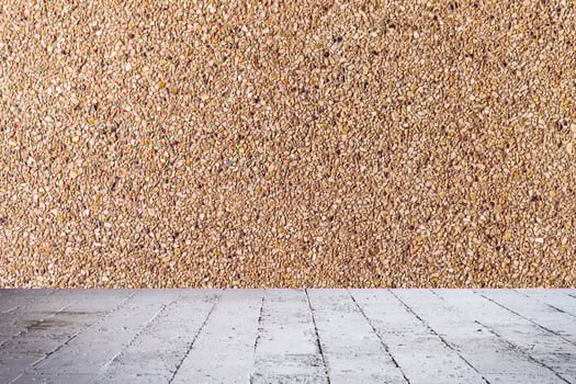 A room with a wall made of sand photo