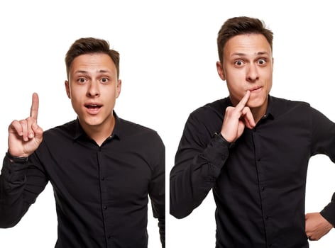 Stylish young man posing and looking at the camera, isolated on a white background photo