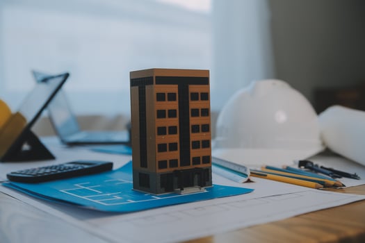 Construction and structure concept of Engineer or architect meeting for project working with partner and engineering tools on model building and blueprint in working site, contract for both companies. photo