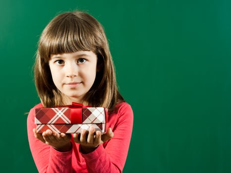 Little girl with gift box photo