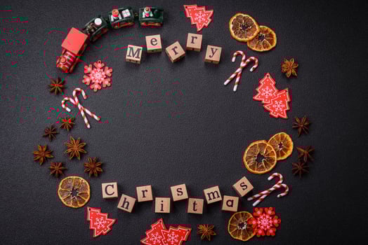 Beautiful Christmas composition with copy space with an inscription in wooden cubes photo