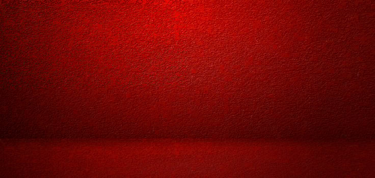 The floor and walls of the room are red as the background. photo