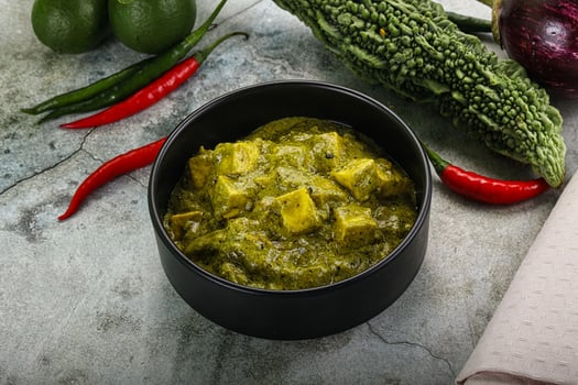 Indian cuisine - palak paneer cheese with spinach photo