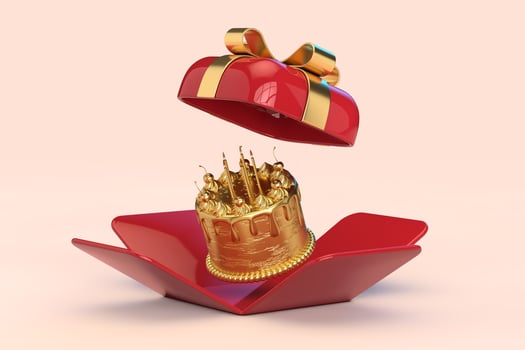 Abstract Golden Birthday Cartoon Dessert Cherry Cake with Candles in Opened Red Gift Box with Golden Ribbon. 3d Rendering photo