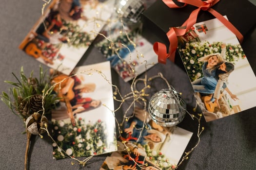 a Photobook of family. Photobook is gift. photo album next to gifts