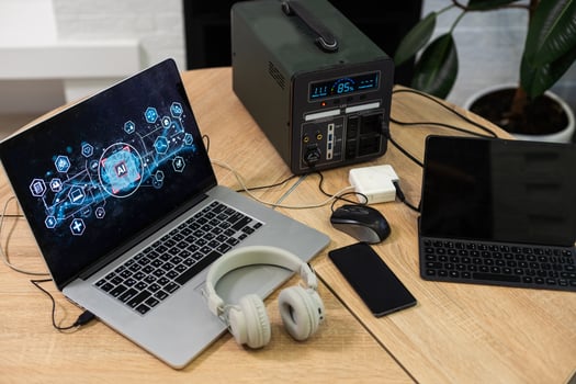 Portable power station solar electricity generator laptop, phone, tablet and digital camera electronic devices charging. Wireless charging battery backup, power outage emergencies outdoors, camping photo