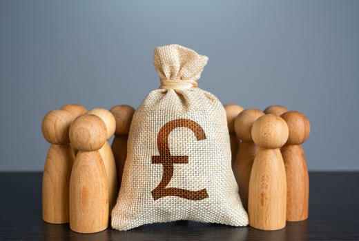 People figures stand around british pound sterling money bag. Organization of the community budget. Social politics. Deposits and loans. Salaries. Social payments. Crowdfunding and fundraising. photo