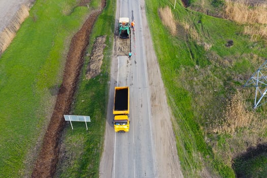 Top view of the road repair. Technics for repair of asphalt. Replacement of asphalt pavement. photo